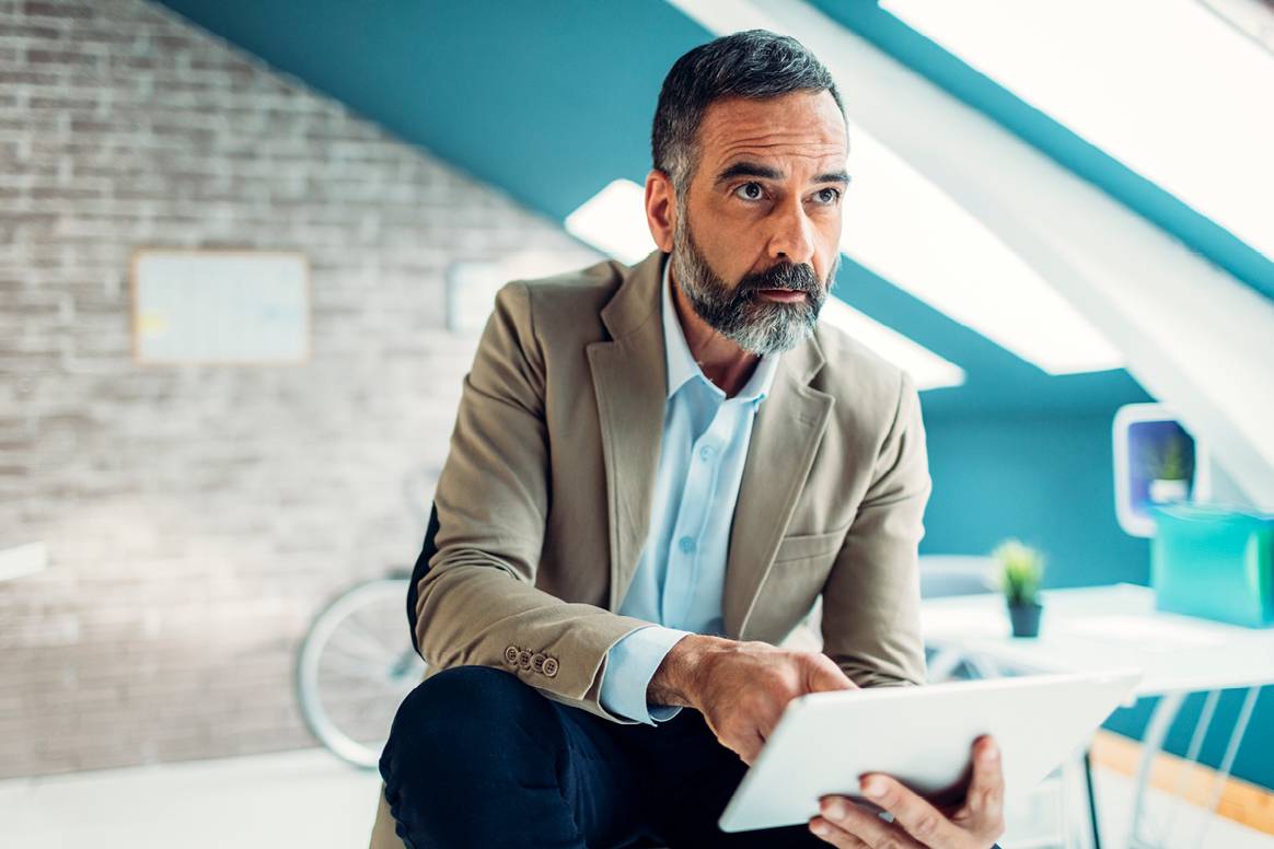 Person sitting on tablet looking into the distance